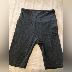 Soft stretch shorts. OS . Fits as a small. Dark gray color.